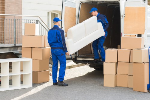 Furniture removals team preparing items for a Stepney home move