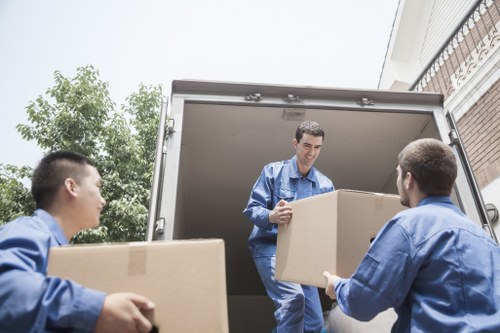 Packing and loading household items into a removal van in Stepney