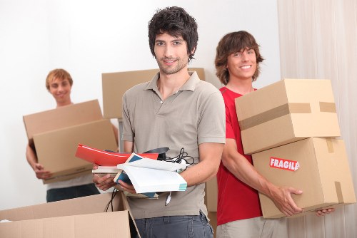 Careful unloading of student items at a Stepney property