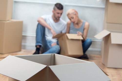 Local movers loading furniture for a Stepney home relocation