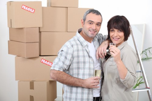 Business team preparing for an office relocation in Stepney with careful packing